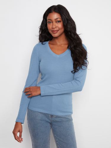 This top features a flattering V neckline, perfect for any occasion. Made from a stretch cotton-tencel blend for comfort by Charlie B.