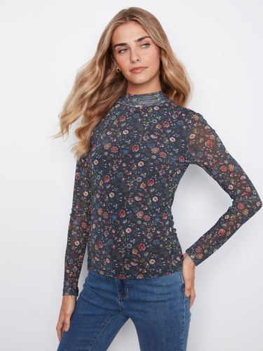 Floral top featuring a mock neckline, offering a chic and sophisticated look by Charlie B.