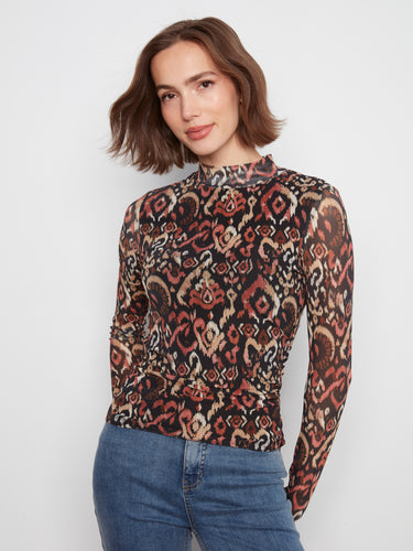 This top features a mock neckline in a vibrant pattern, offering a chic and stylish look for any occasion. By Charlie B.