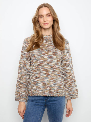 A relaxed fit sweater in space-dyed knit, showcasing its cozy appeal by Charlie B.