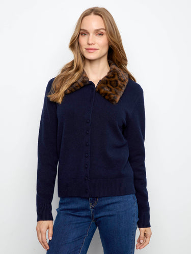 Navy cardigan featuring a stylish button-up front, complemented by long sleeves for added warmth by Charlie B.