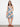 Sleeveless floral dress with hidden pockets, adorned with a vibrant pattern by Charlie B.
