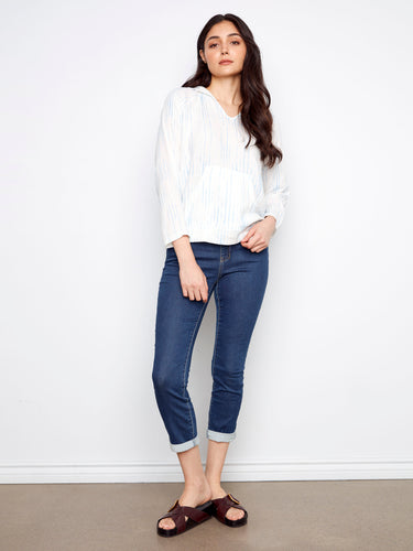 Chic top featuring a convenient kangaroo pocket, ideal for keeping essentials close while maintaining effortless style. By Charlie B.