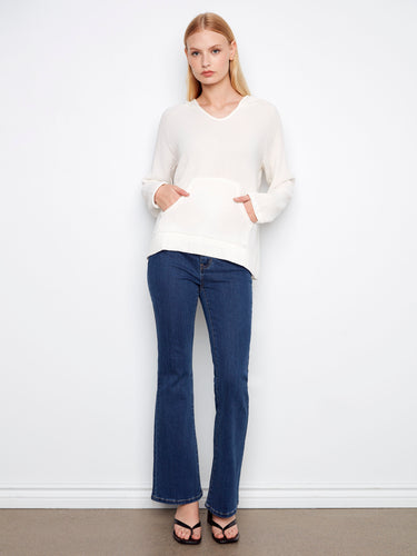 Enjoy the convenience of a kangaroo pocket with this elegant top, crafted in soft cotton for everyday wear. Ideal for layering by Charlie B.