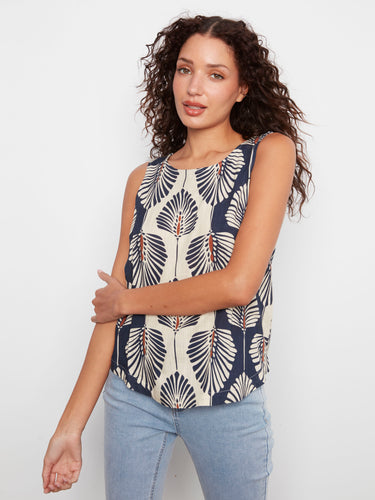 Serene blue floral print linen blend blouse with a stylish scoop neckline and sleeveless cut by Charlie B.