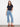 Stylish denim pants with a bootcut fit and fringed hem detail, offering a chic twist on classic jeans by Charlie B.