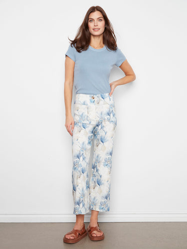 Floral pants in a stretch linen blend, showcasing their comfortable wide leg design. A perfect addition to your wardrobe by Charlie B.