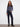 Blue-black jeans featuring a straight fit and long length, perfect for versatile styling. Crafted in stretch denim by Charlie B.