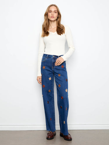 These jeans feature a wide fit and charming flower embroidery, perfect for a relaxed yet stylish look by Charlie B.