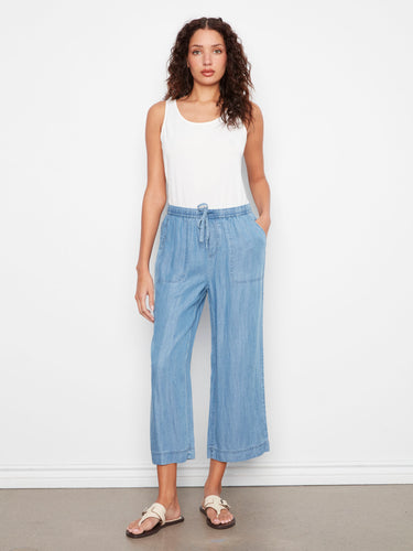 Designed with an elastic waistband, these pants provide a comfortable fit that moves with you all day. By Charlie B.