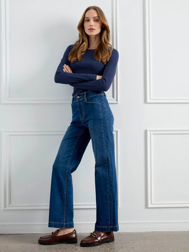 Denim jeans with a straight fit, showcasing front panel pockets for added style by Charlie B.