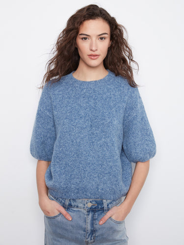 Blue knit sweater featuring a relaxed fit and mock neckline, perfect for casual outings by Charlie B.