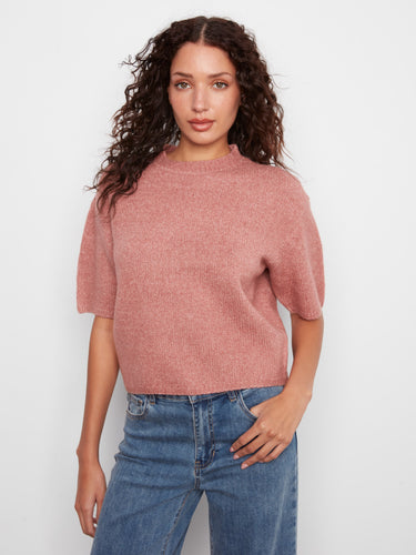 Elegant mock neck sweater with a soft brushed knit design, perfect for cozy days. By Charlie B.
