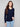 Classic navy sweater with V neckline, perfect for layering or wearing alone for effortless elegance by Charlie B.