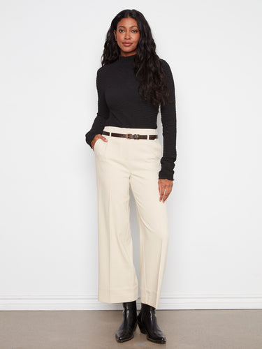 These trousers feature a wide leg silhouette that adds a touch of elegance to any outfit. Crafted with care by Charlie B.