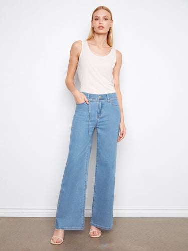 These jeans feature a wide leg design, offering a stylish and comfortable fit for any occasion. By Charlie B.
