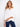 White blouse with long roll-up sleeves and a front knot, crafted from 100% cotton for comfort and style by Charlie B.