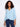 Light blue blouse with a stylish notch neckline and long roll-up sleeves, crafted from 100% cotton for comfort by Charlie B.