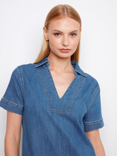 Featuring knee length for a versatile look, this denim dress pairs perfectly with casual or chic accessories by Charlie B.