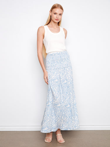 Convertible floral piece in light blue, showcasing its midi length and stylish versatility by Charlie B.