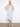Light blue floral pattern dress with removable straps for a personalized look, offering elegant versatility by Charlie B.