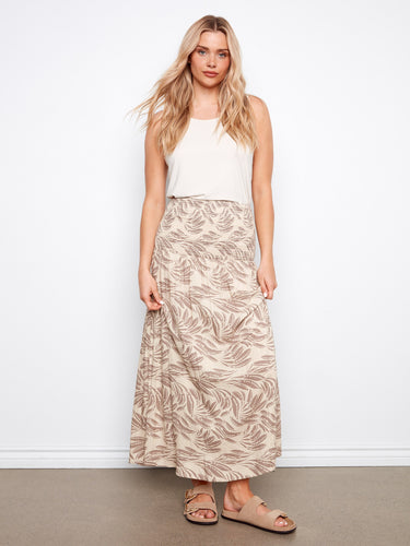 This versatile piece features removable straps, offering a unique style option for any occasion. By Charlie B.