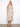 Designed to be worn as a skirt or dress, this garment provides flexibility and elegance. By Charlie B.