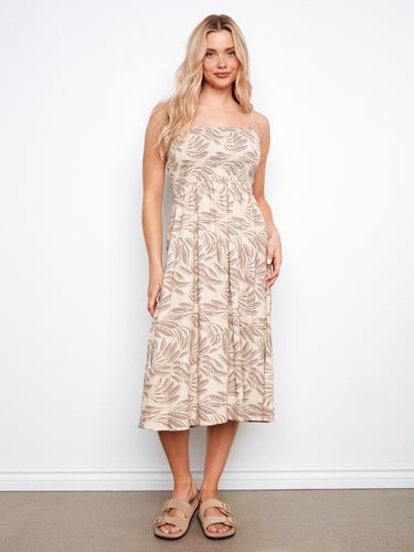 Designed to be worn as a skirt or dress, this garment provides flexibility and elegance. By Charlie B.