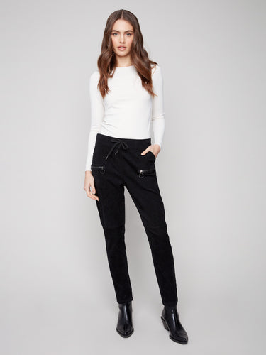 Slim fit black corduroy joggers with zipper pockets and elastic waistband for a comfortable style by Charlie B.