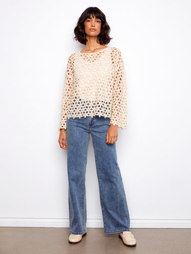 Stylish top featuring drop shoulders, offering a comfortable and chic look. A versatile addition to your wardrobe by Charlie B.