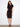 Elegant dress with a boat neckline, perfect for any occasion. The design is both sophisticated and timeless by Charlie B.