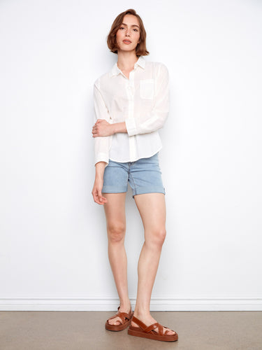 Stylish white shirt showcasing adjustable roll-up sleeves, perfect for versatile wear by Charlie B.