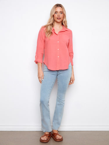 Enjoy the ease of the button-front closure on this versatile shirt, tailored for comfort and style by Charlie B.