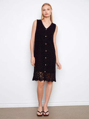 Elegant dress featuring a V-neckline and sleeveless design, perfect for warm weather outings. Crafted with care by Charlie B.