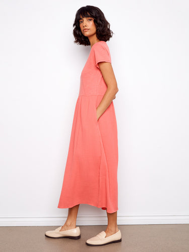The midi length of this dress makes it versatile for various occasions, adding an elegant touch by Charlie B.