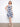 Classic knee-length floral dress designed with hidden pockets for added functionality. By Charlie B.