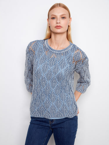 Blue haze crochet sweater featuring a relaxed fit and intricate pattern for a chic look by Charlie B.