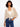 Beige crochet shrug with elbow dolman sleeves and a subtle metallic effect, perfect for layering by Charlie B.