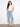 Cropped flare jeans in light blue with a regular rise, showcasing intricate lace hem details for a chic look by Charlie B.