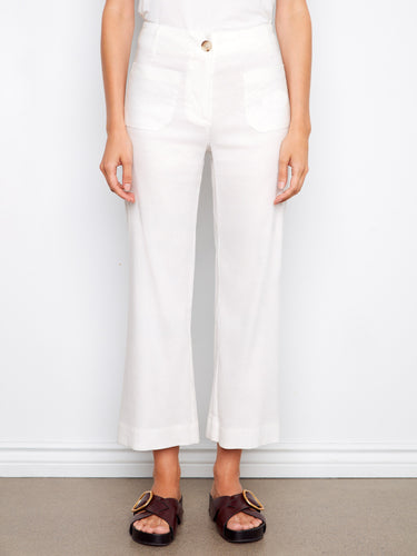 Cropped length adds a modern twist to these versatile white pants by Charlie B.