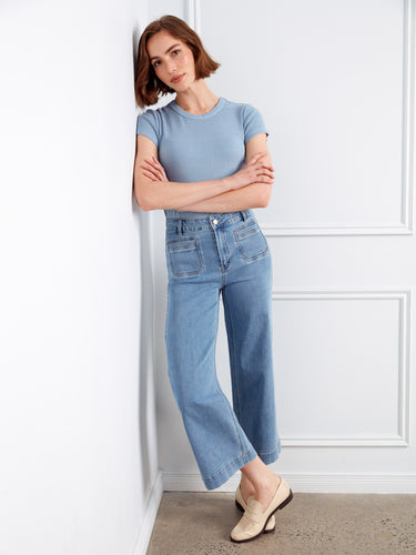 Jeans crafted from stretch denim fabric, designed with back pockets for functionality and style. Perfect for any casual look by Charlie B.