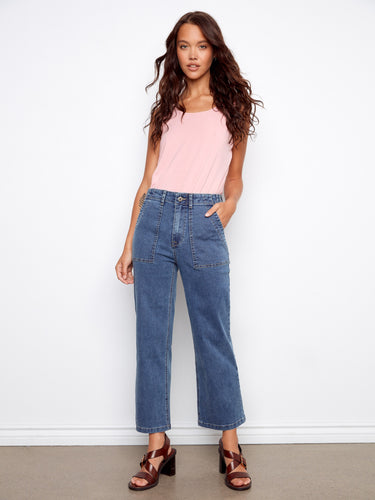 These jeans feature a straight fit, offering a classic silhouette for versatile styling by Charlie B.