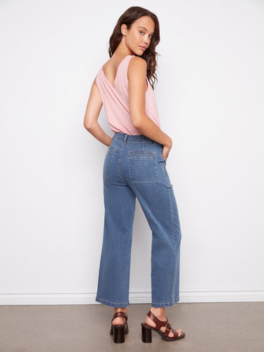 Designed with utility style pockets, these jeans add a functional touch to your casual wardrobe by Charlie B.