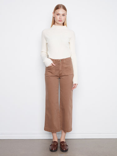 These pants feature a wide leg design, adding a touch of elegance to any outfit. Perfect for casual or formal settings by Charlie B.