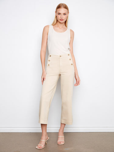 Beige cropped pants featuring a wide leg design with elegant side button details, crafted from stretch twill fabric by Charlie B.