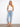 Light blue jeans with a slim fit, featuring a five-pocket design and cuffed hem for style by Charlie B.