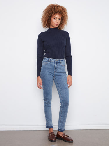 Medium blue jeans with a regular rise and slim leg, featuring a comfortable stretch denim by Charlie B.
