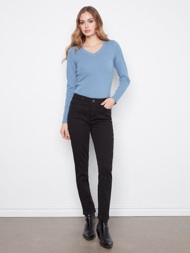 These pants feature a slim leg design, offering a sleek and modern silhouette for any occasion by Charlie B.