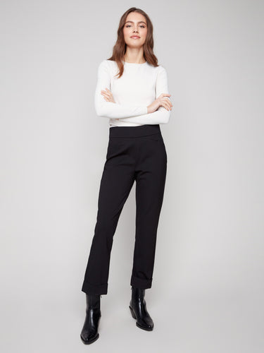 Black ponte pants featuring a straight leg design and cuffed hems, crafted for style and comfort by Charlie B.