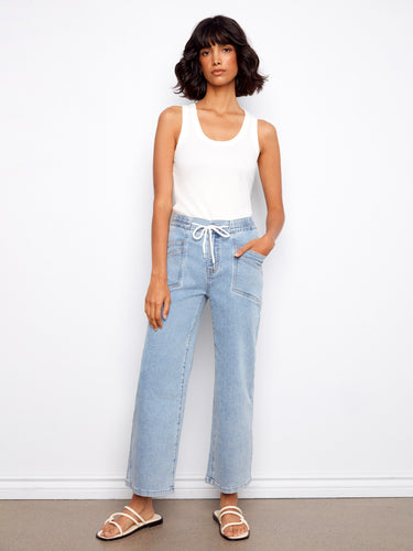 These jeans feature a wide leg fit that adds a relaxed vibe to any outfit. Perfect for casual days out. By Charlie B.